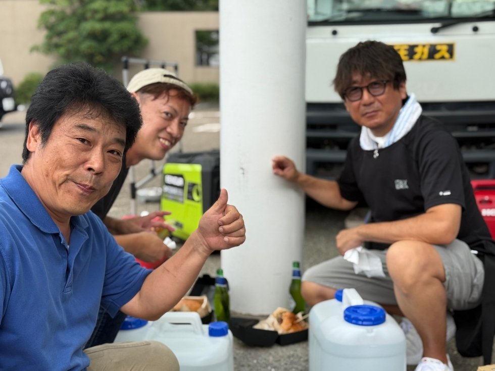 アトラス社長とイベント運営者の集合写真